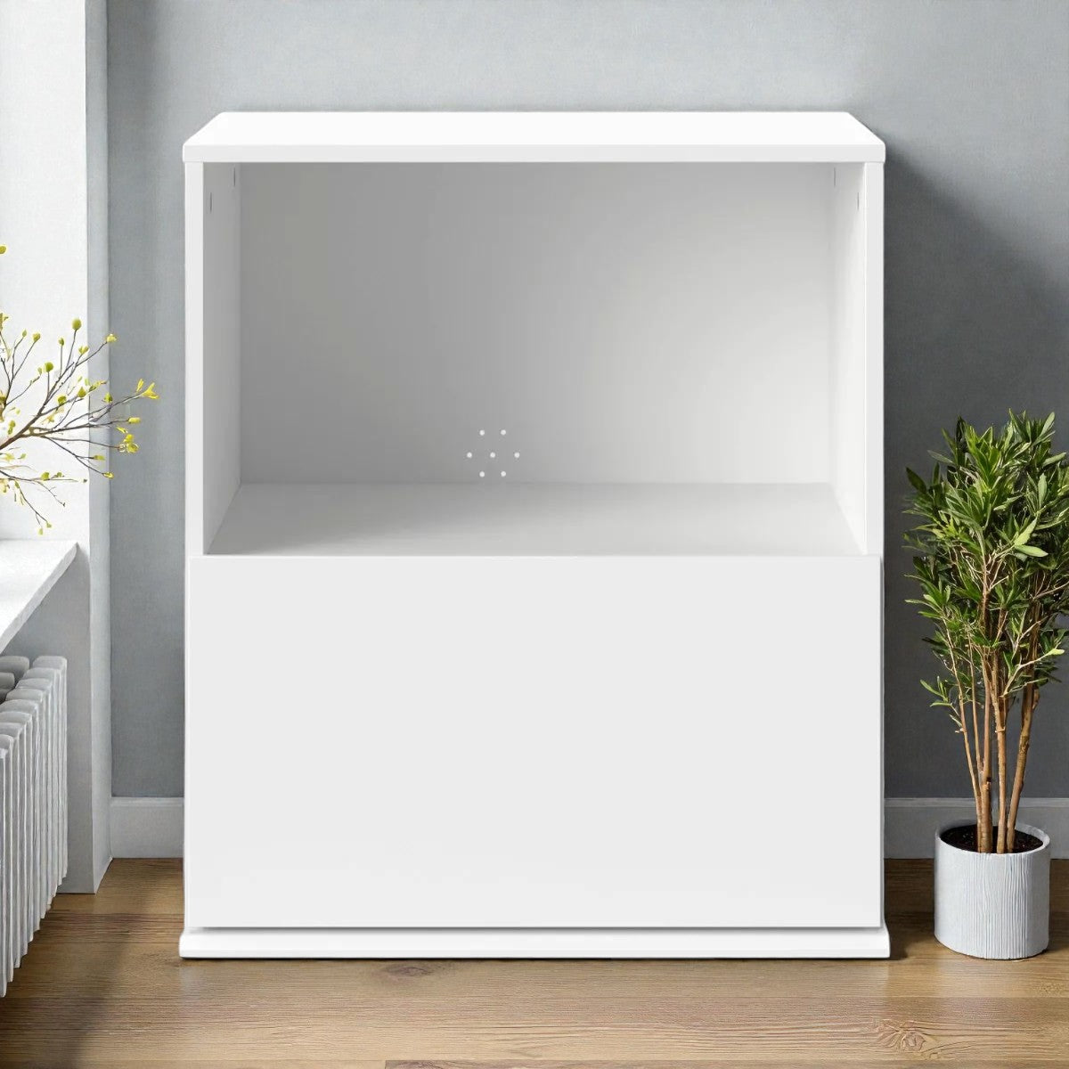 Modern white aquarium fish tank with wooden floor and green potted plant beside it