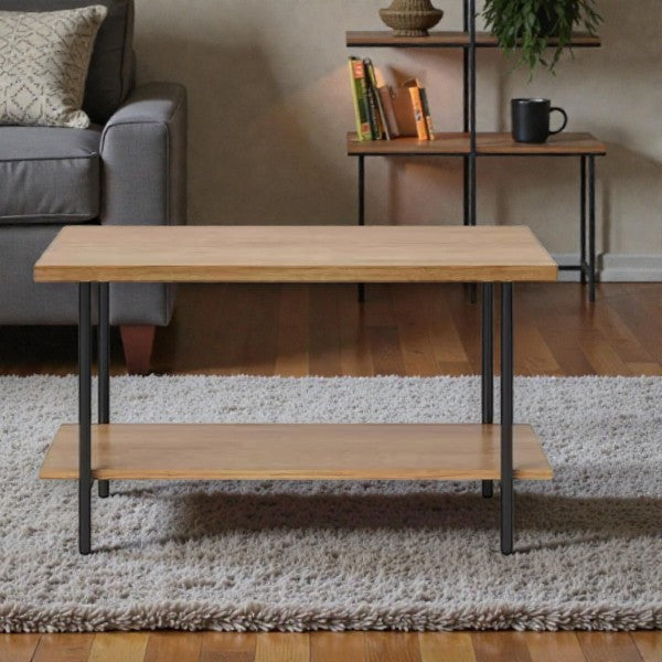 Modern living room with wooden coffee table featuring metal legs on gray shag rug