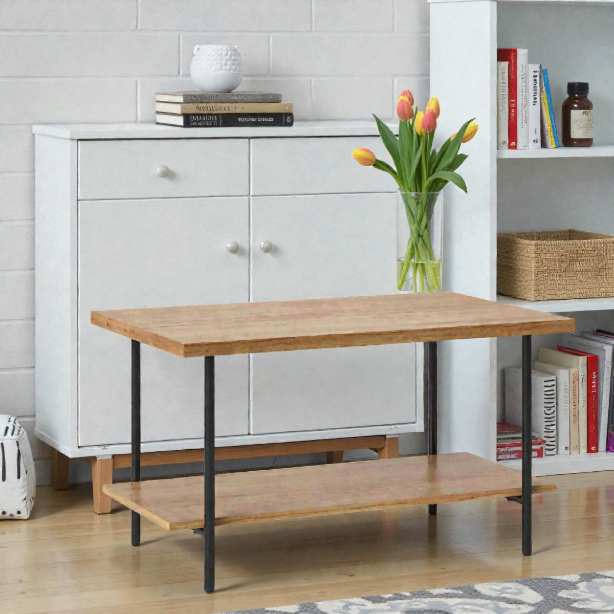Wooden coffee table with black metal legs in living room, white cabinet and tulips vase background