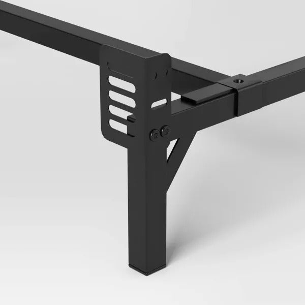 black metal adjustable bed frame corner with slotted support brackets and screws